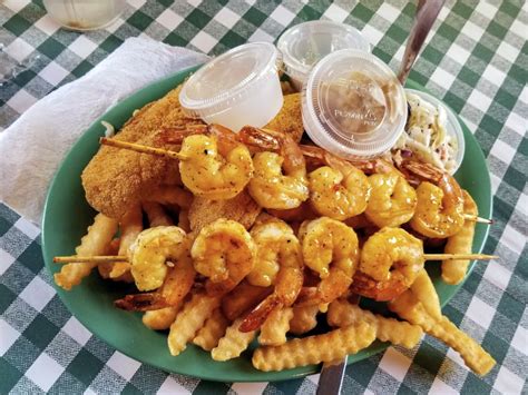 Docs seafood shack - At Doc's Seafood Shack & Oyster Bar, taste meets tradition with every plate served. Earning its exalted status in Orange Beach, the restaurant's menu is a treasure trove of the Gulf's gems. For appetizers, you can't go wrong with the Seafood Gumbo, the Dynamite Shrimp, or World Famous Homemade Onion Rings. 